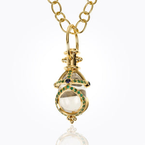 18K Stupa Amulet with oval rock crystal, blue sapphire and tsavorite